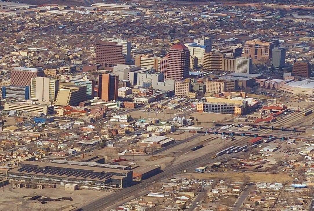 Downtown Albuquerque skyline in warm adobe and sand tones